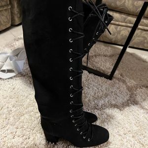 BCBG heeled lace up boots